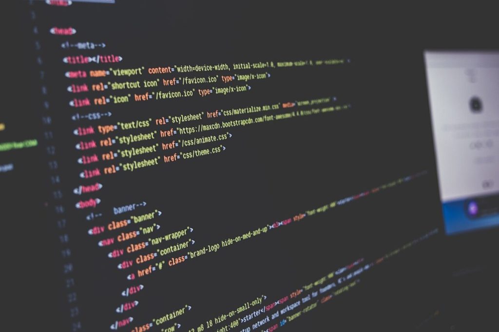 Colourful computer code displayed on a dark screen